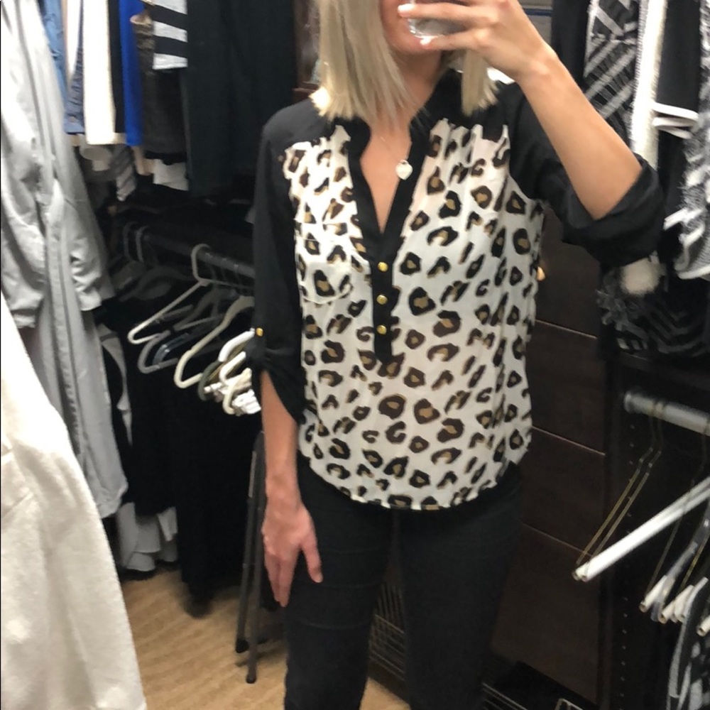 Animal print, half button up top.